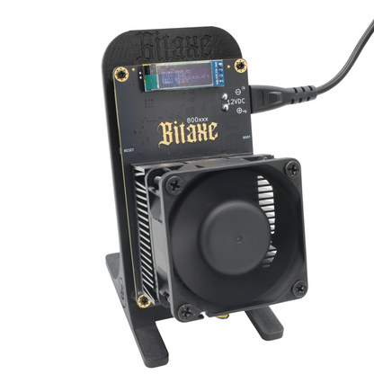 Bitaxe GT 800 black home miner, angled view with display and cooling fan